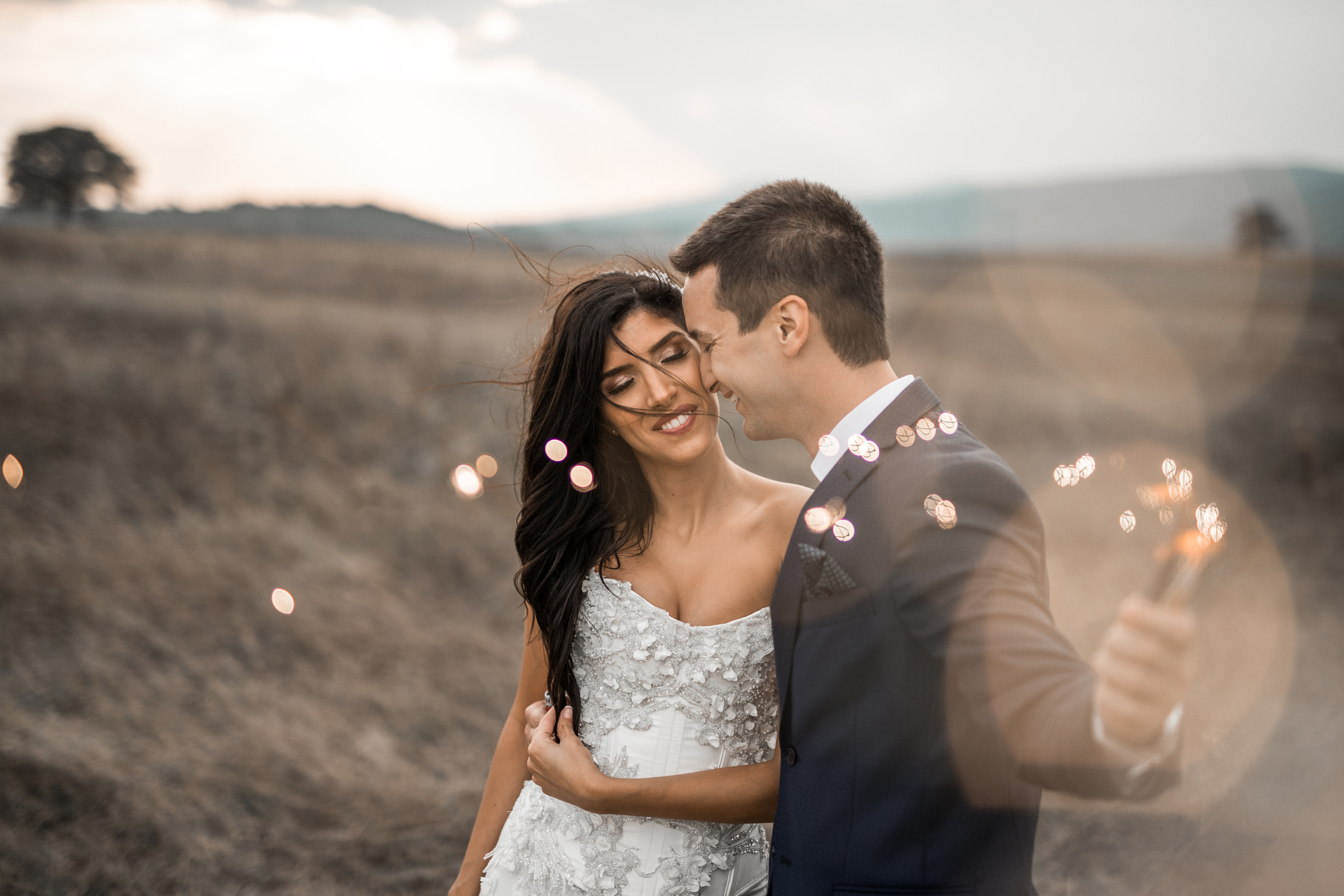 Just married couple celebrating their love with sparkler