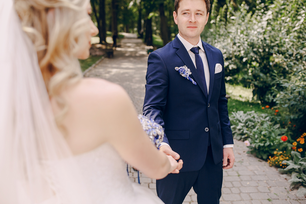 the groom cries as he saw her stunning wedding bride in her wedding dress.