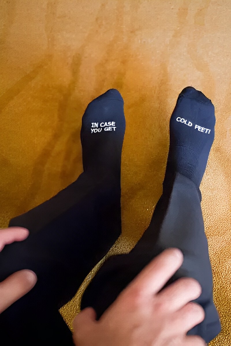 cute socks for the groom with some humor written