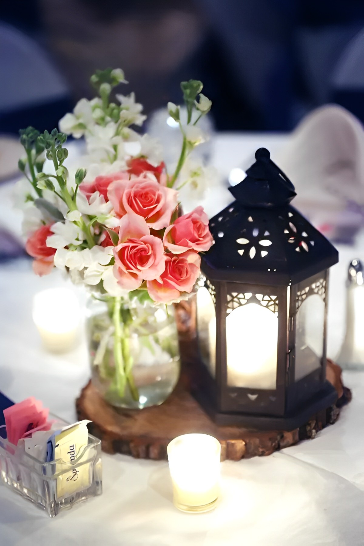 The magnificent centerpiece described was ideal for a winter wedding with a color scheme of mint, coral, and grey. The arrangement unquestionably provided a sense of refinement and beauty to the event's overall decor.