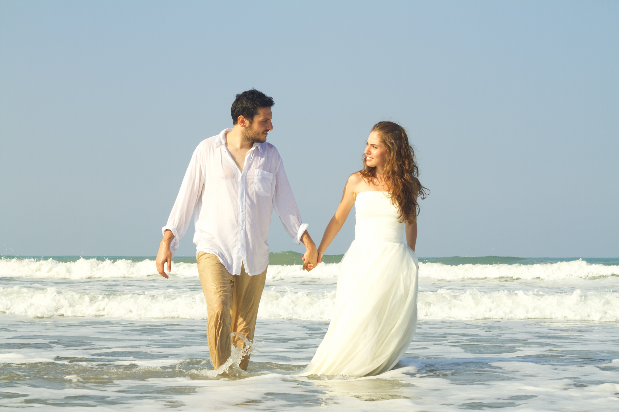 Bride and groom at beach wedding shoot